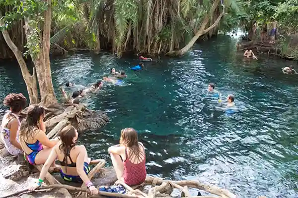 Family swimming Chemka Springs day trip