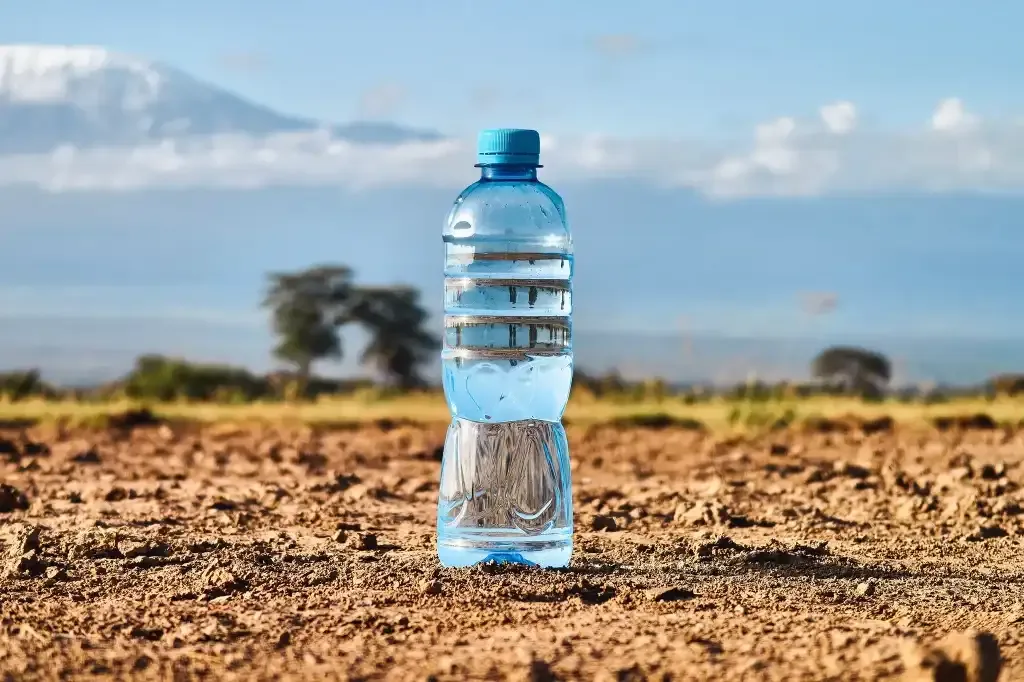 Trekker drinking water on Mount Kilimanjaro