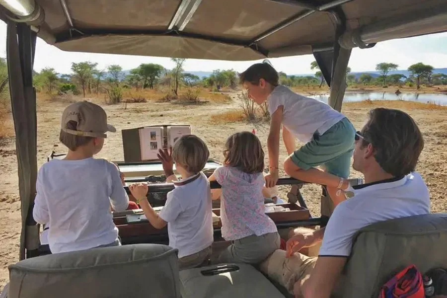 Family enjoying a December Tanzania safari with wildlife and Zanzibar beaches