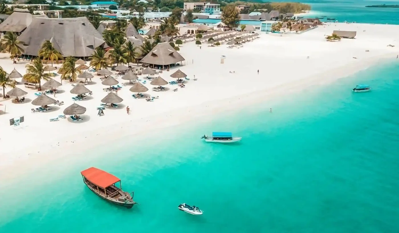 Pristine Kendwa Beach with white sands and turquoise waters, perfect for relaxation and sunsets