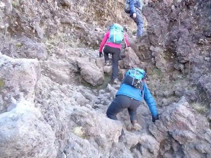 Trekker on the steep Umbwe Route of Mount Kilimanjaro