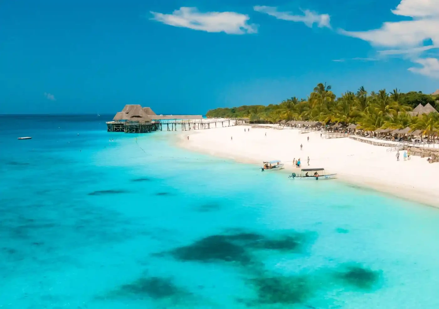 Pristine Zanzibar beach with white sand and turquoise waters, perfect for a beach holiday