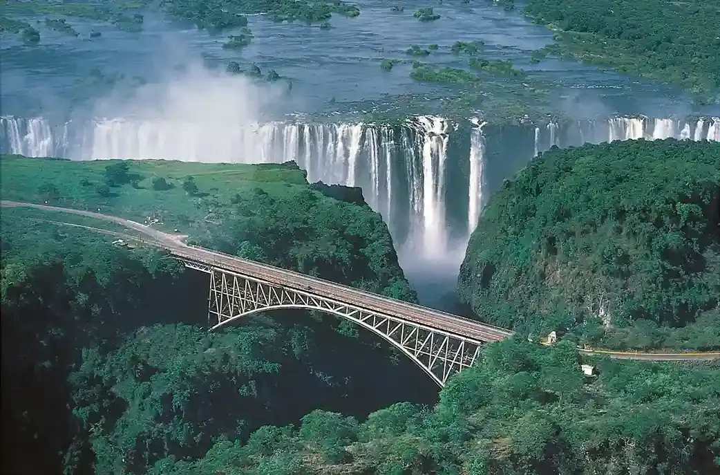 Swimmers at Devil's Pool edge during Victoria Falls activities